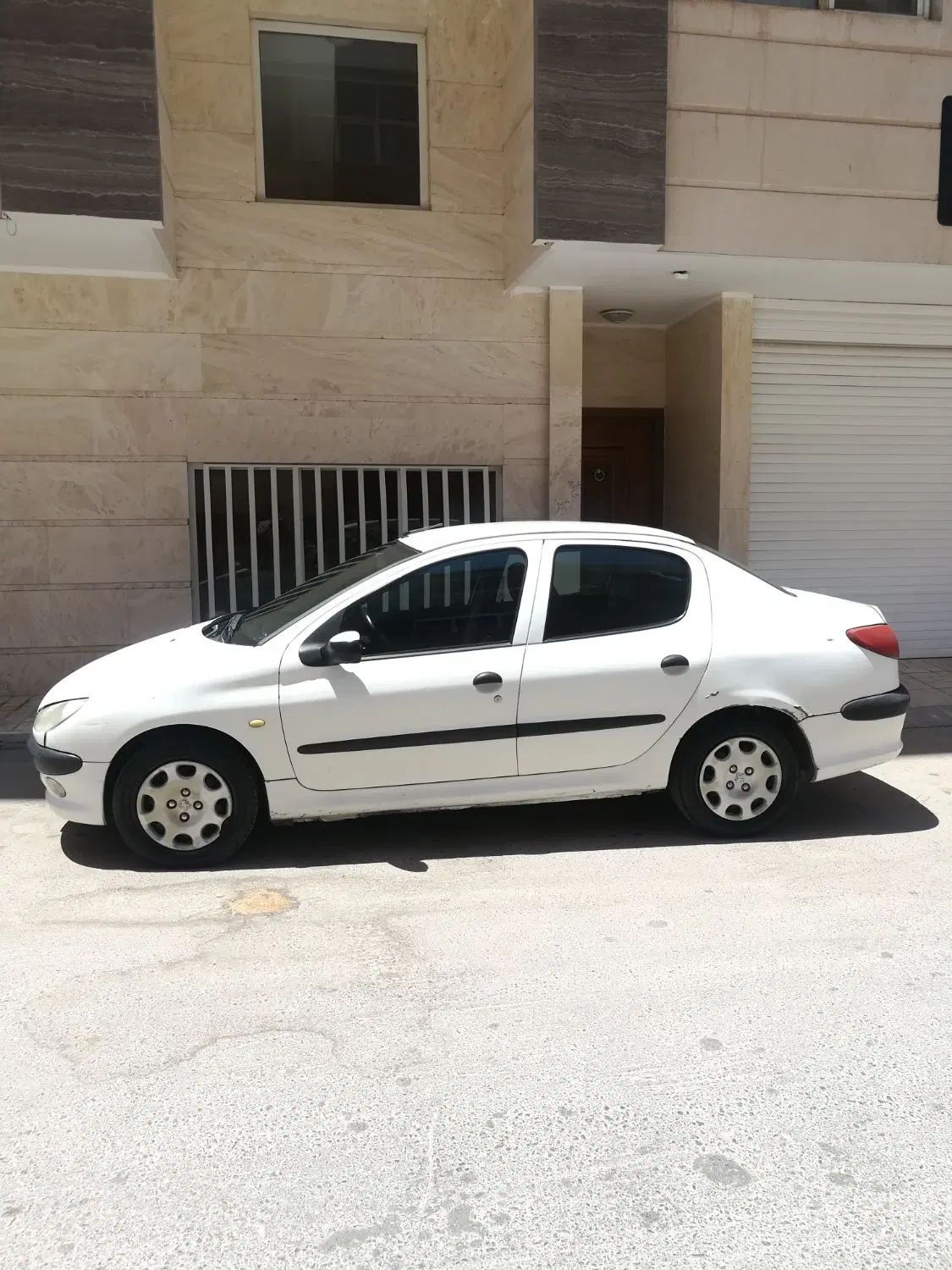 پژو ۲۰۶ صندوق دار v8 - 1391