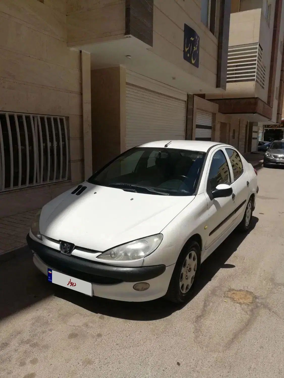 پژو ۲۰۶ صندوق دار v8 - 1391
