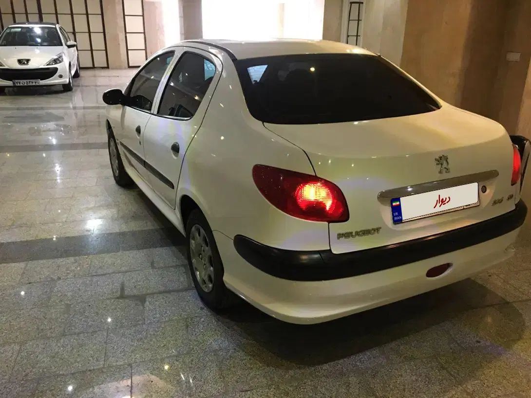 پژو ۲۰۶ صندوق دار v8 - 1398