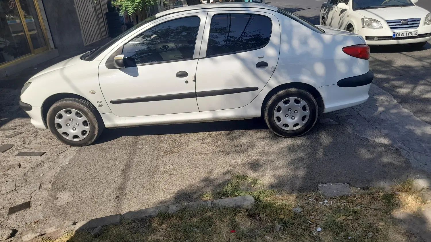 پژو ۲۰۶ صندوق دار v8 - 1400
