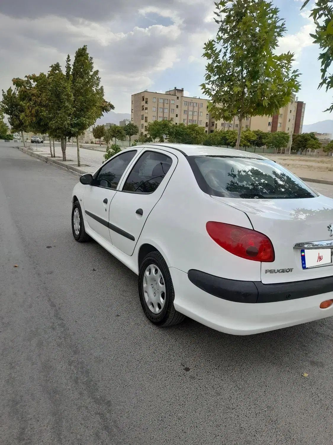 پژو ۲۰۶ صندوق دار v8 - 1394