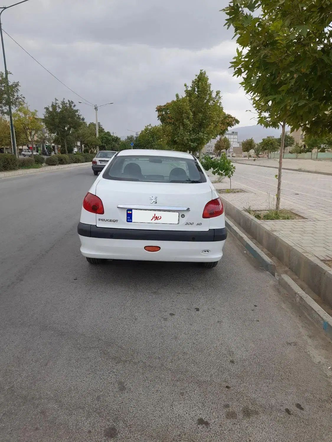 پژو ۲۰۶ صندوق دار v8 - 1394