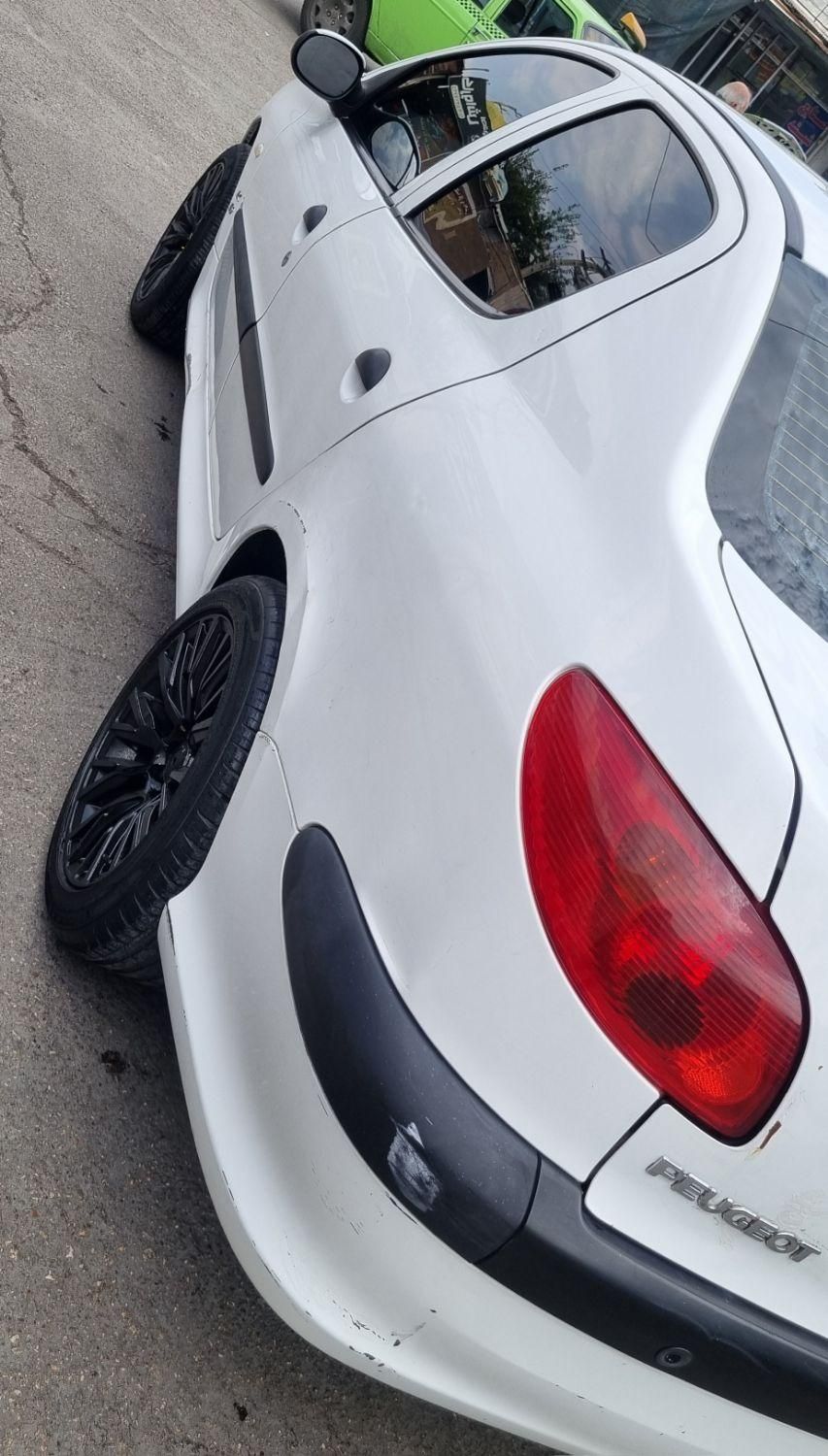 پژو ۲۰۶ صندوق دار v8 - 1396