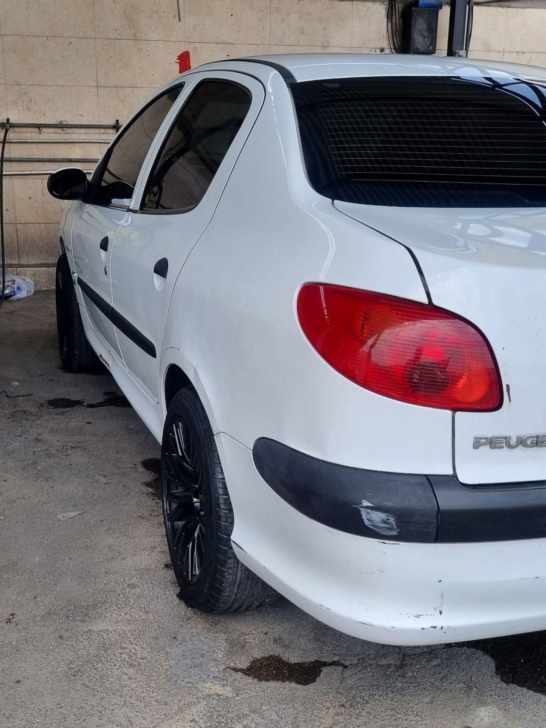 پژو ۲۰۶ صندوق دار v8 - 1396