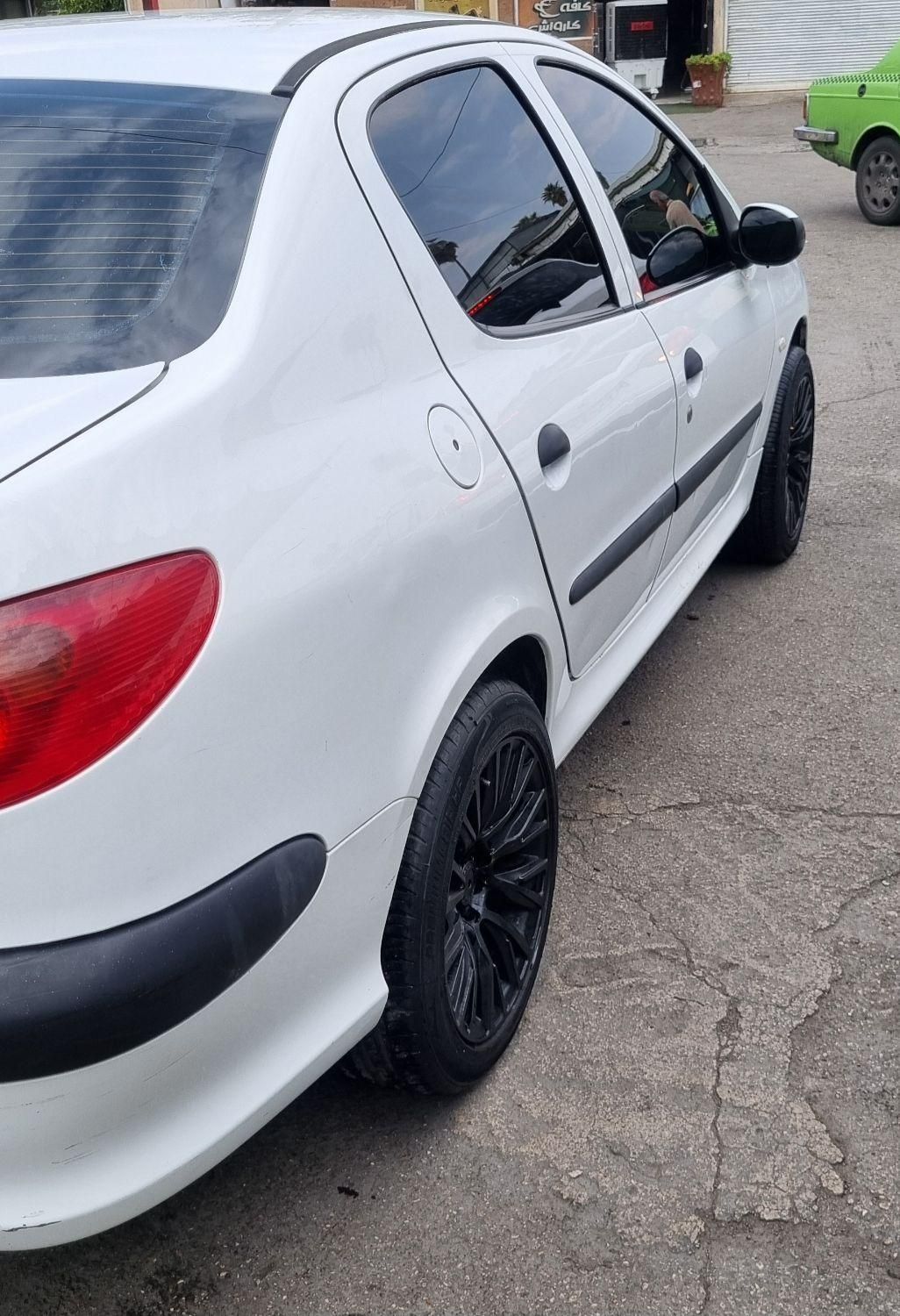 پژو ۲۰۶ صندوق دار v8 - 1396