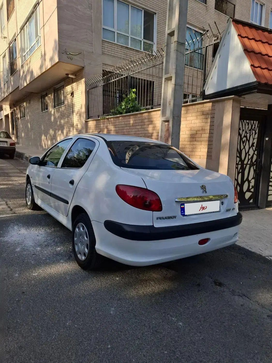 پژو ۲۰۶ صندوق دار v8 - 1395