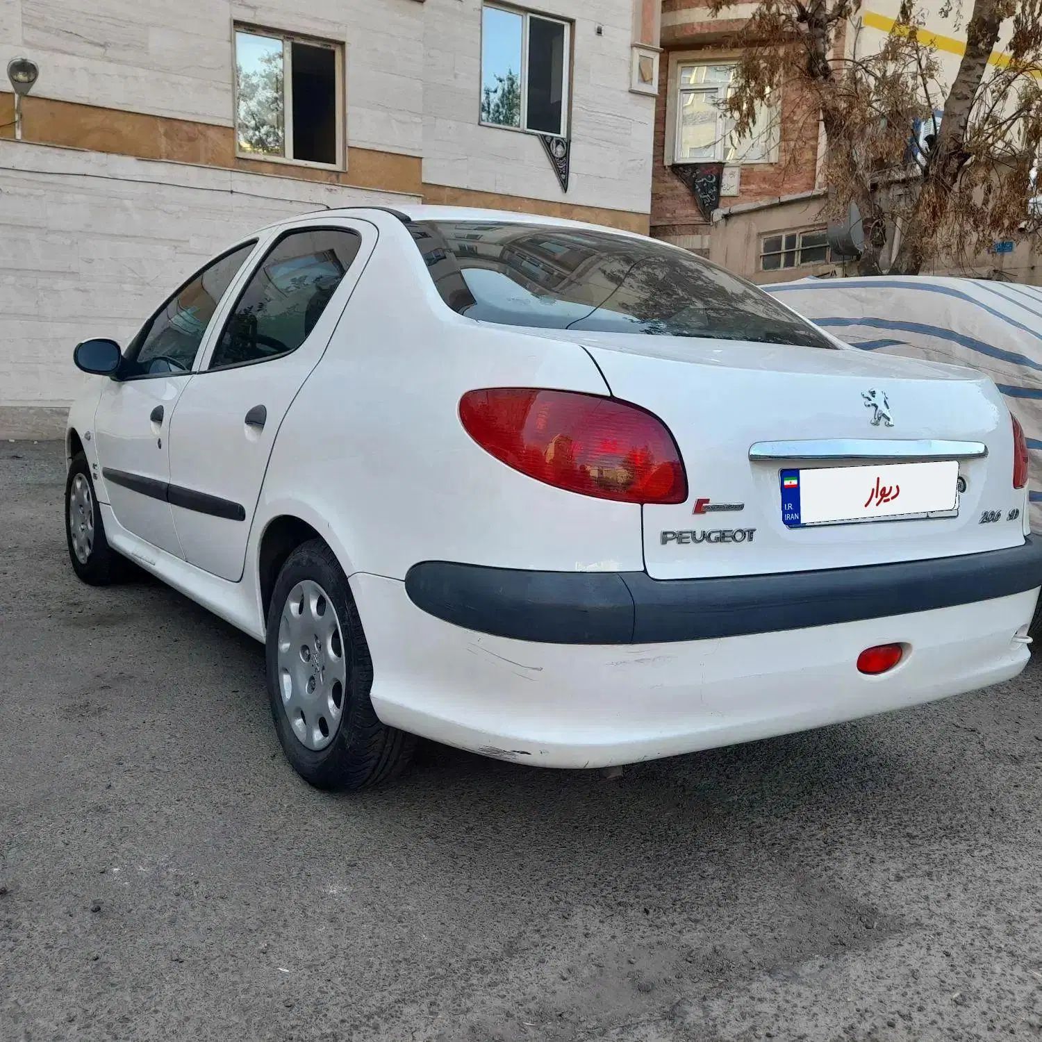 پژو ۲۰۶ صندوق دار v8 - 1399