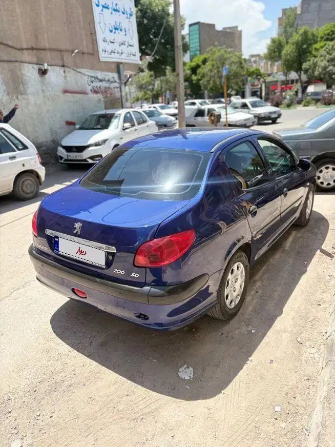 پژو ۲۰۶ صندوق دار v8 - 1397