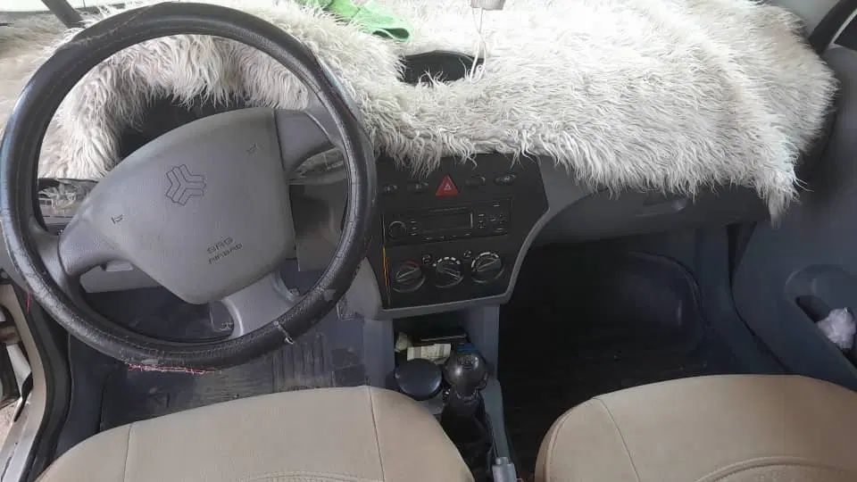تیبا صندوق دار SX - 1400