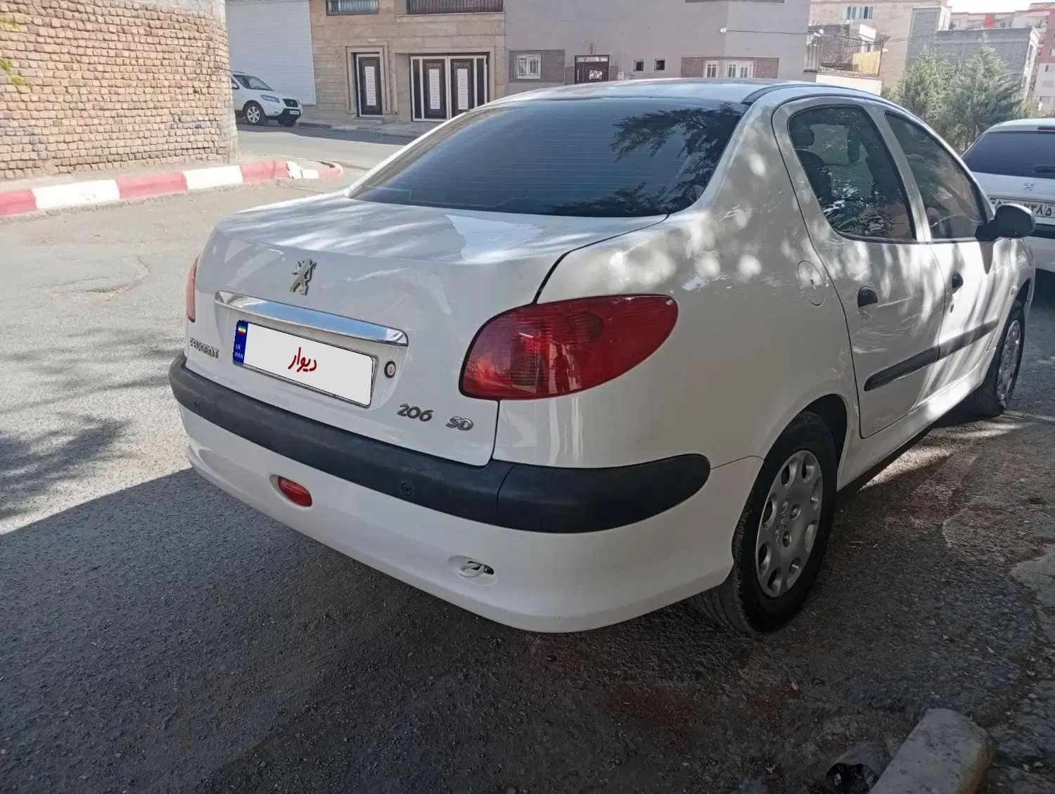 پژو ۲۰۶ صندوق دار v8 - 1396