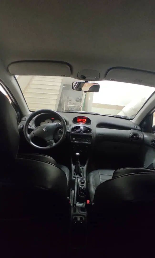 پژو ۲۰۶ صندوق دار v8 - 1396