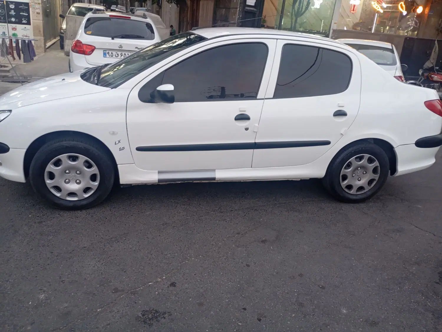 پژو ۲۰۶ صندوق دار v8 - 1395