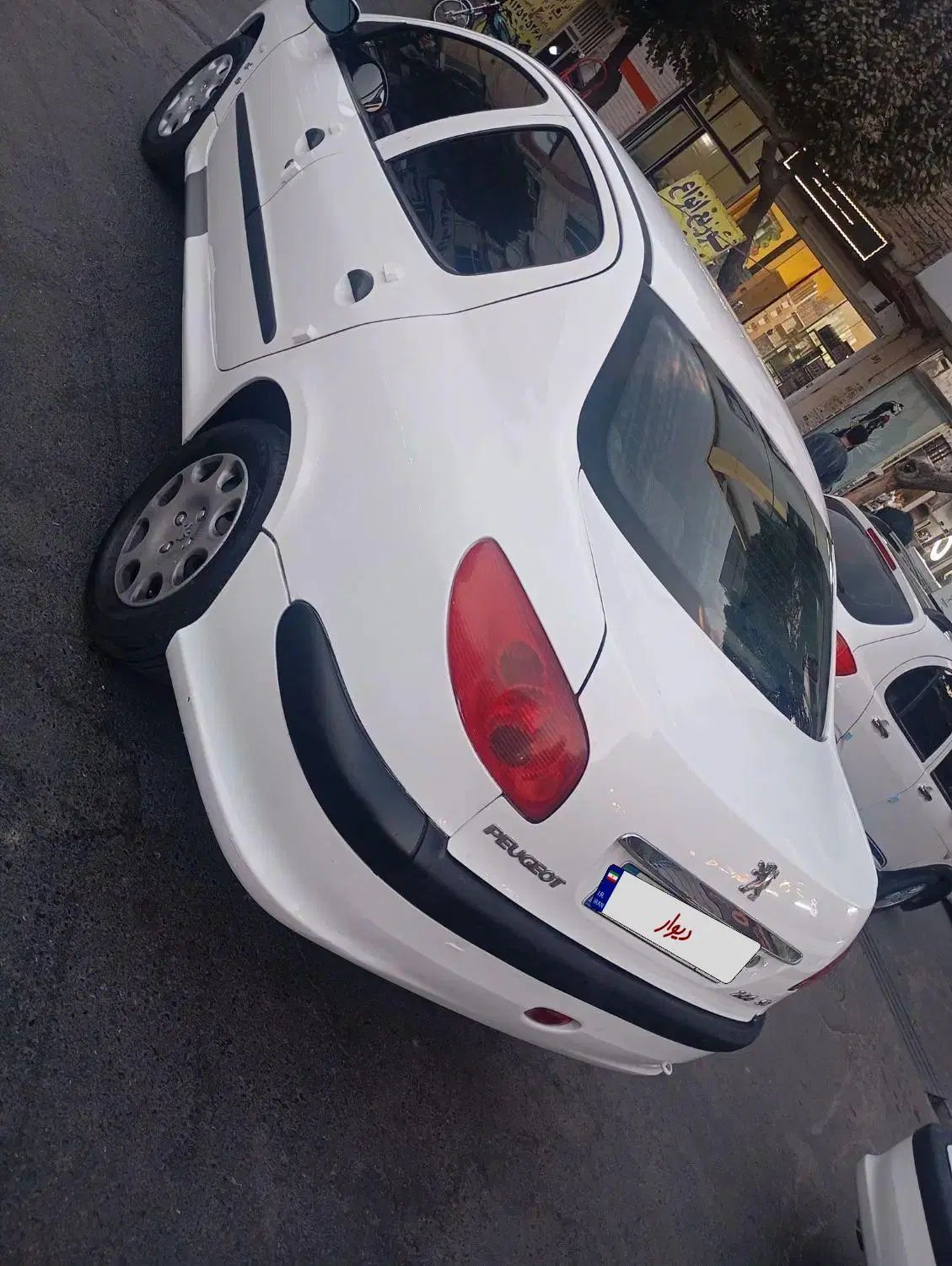 پژو ۲۰۶ صندوق دار v8 - 1395