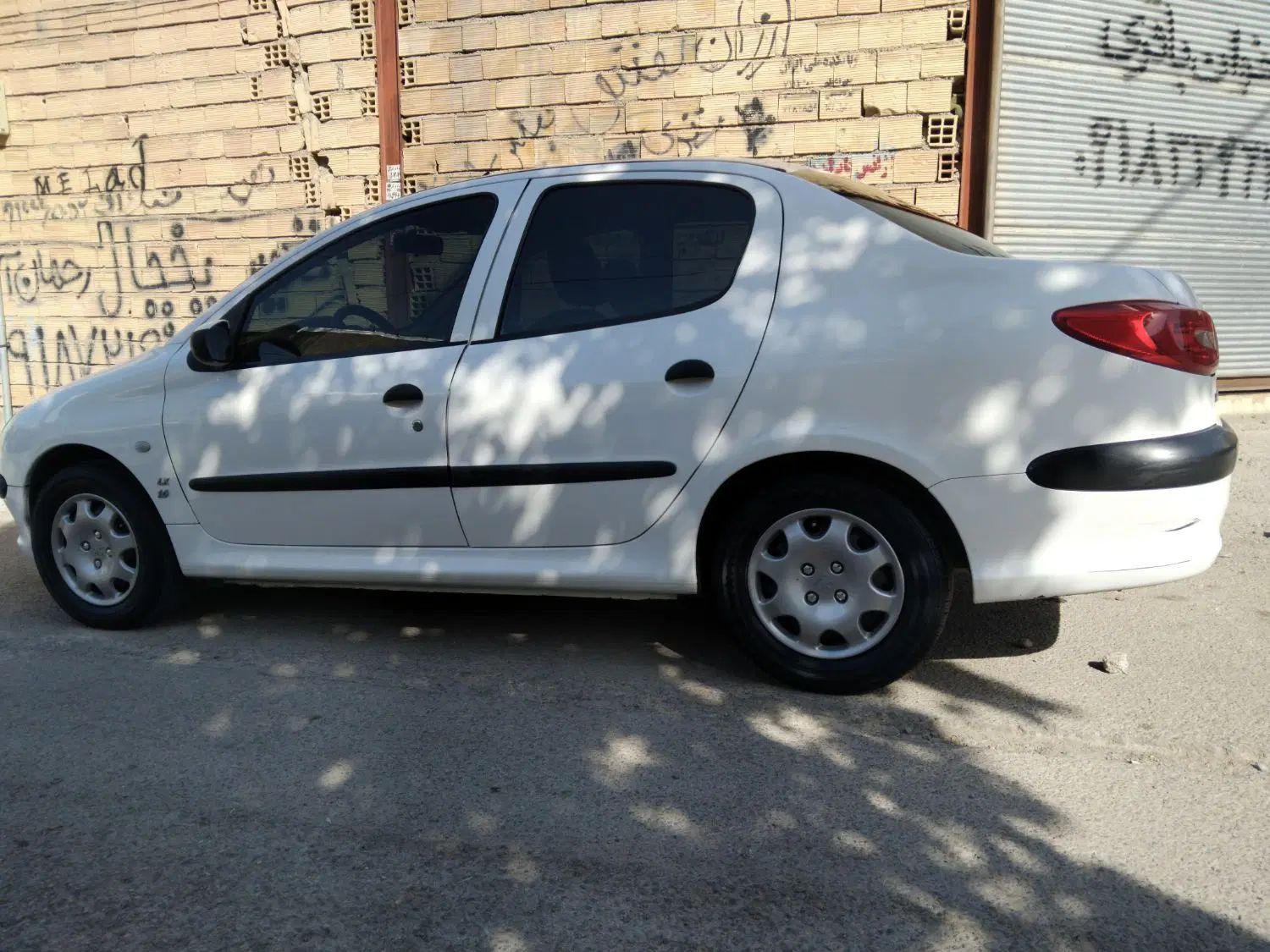 پژو ۲۰۶ صندوق دار v8 - 1395