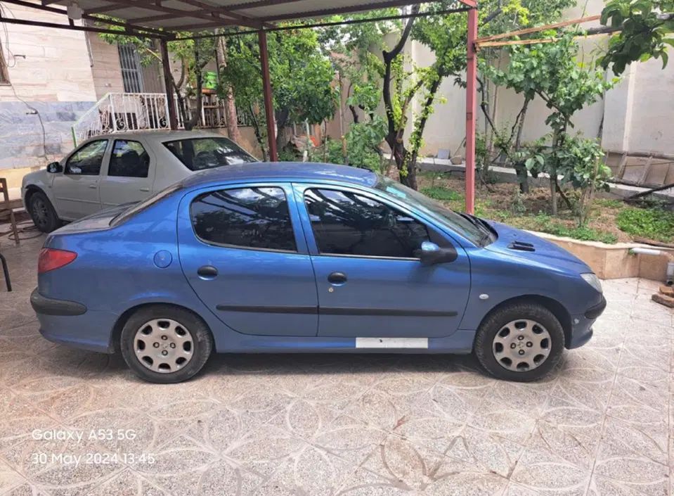 پژو ۲۰۶ صندوق دار v8 - 1396