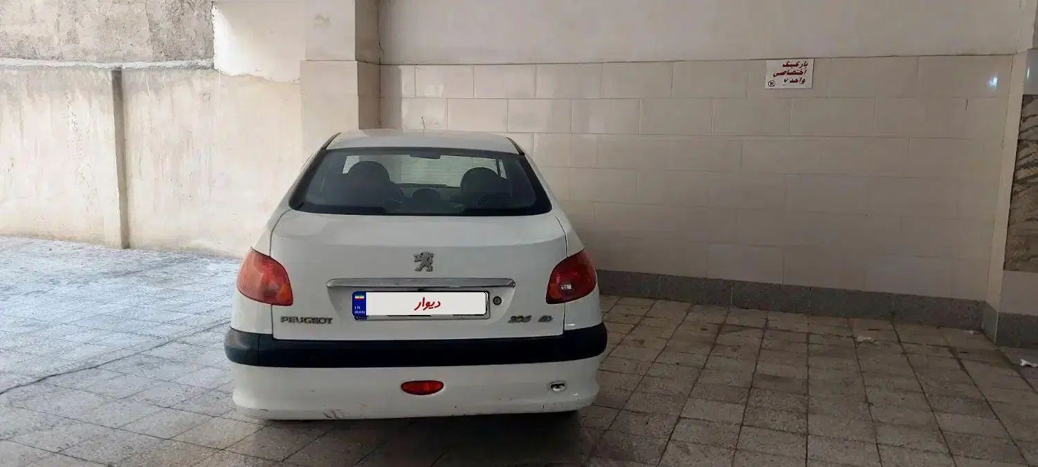 پژو ۲۰۶ صندوق دار v8 - 1396