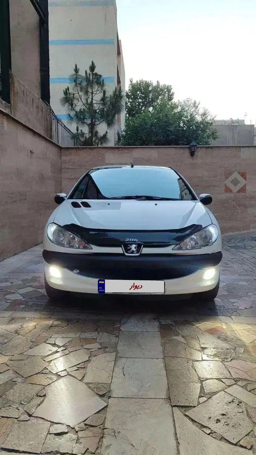 پژو ۲۰۶ صندوق دار v8 - 1391