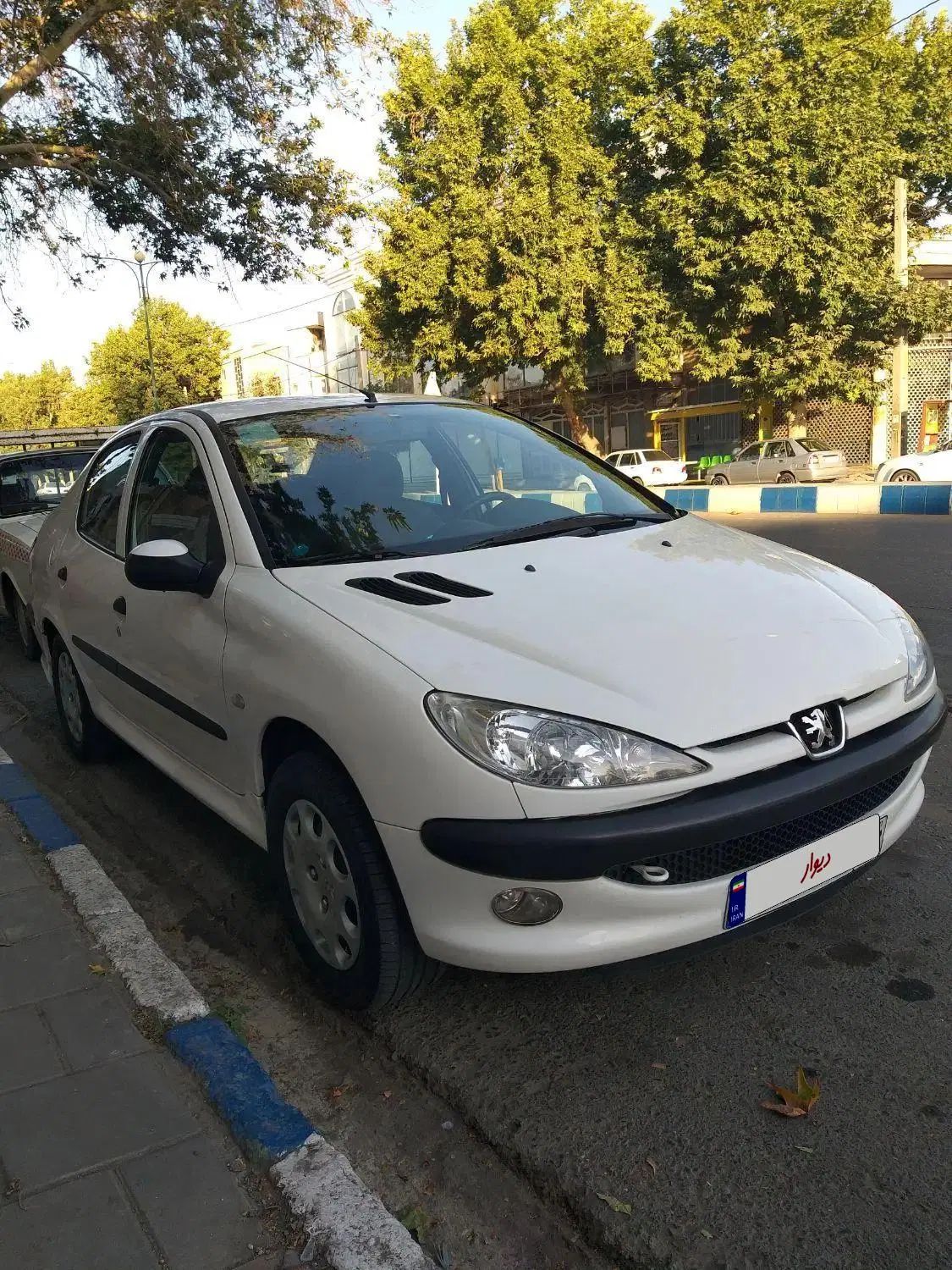 پژو ۲۰۶ صندوق دار v8 - 1396