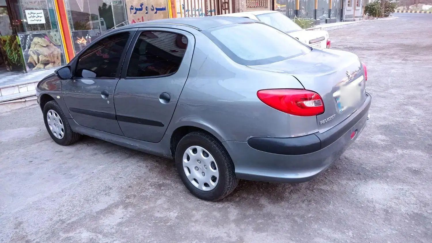پژو ۲۰۶ صندوق دار v8 - 1386