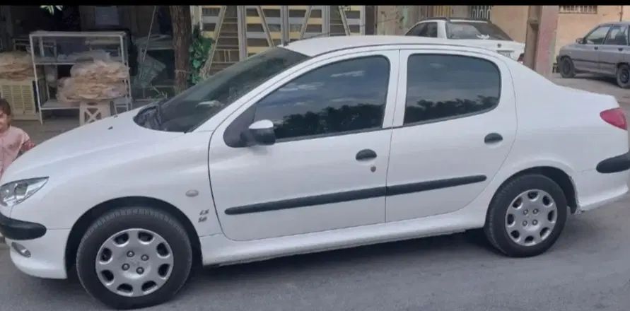 پژو ۲۰۶ صندوق دار v8 - 1391