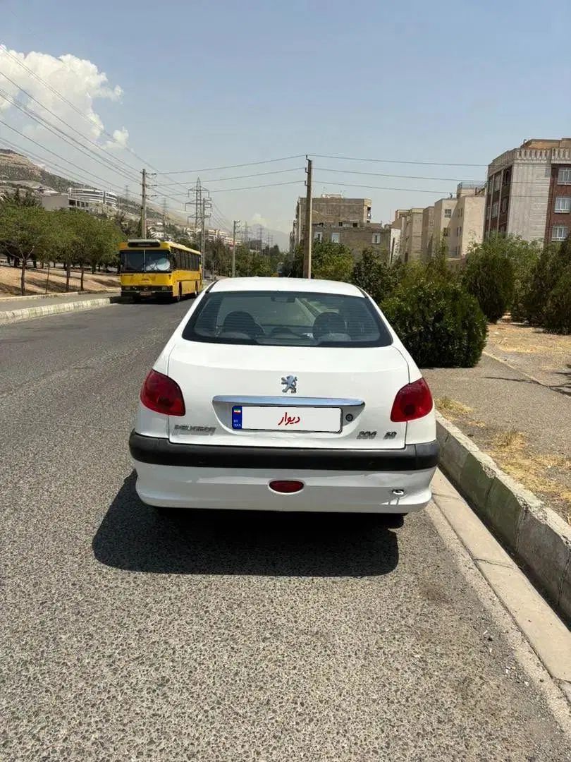 پژو ۲۰۶ صندوق دار v8 - 1394