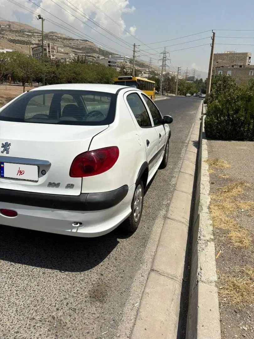 پژو ۲۰۶ صندوق دار v8 - 1394