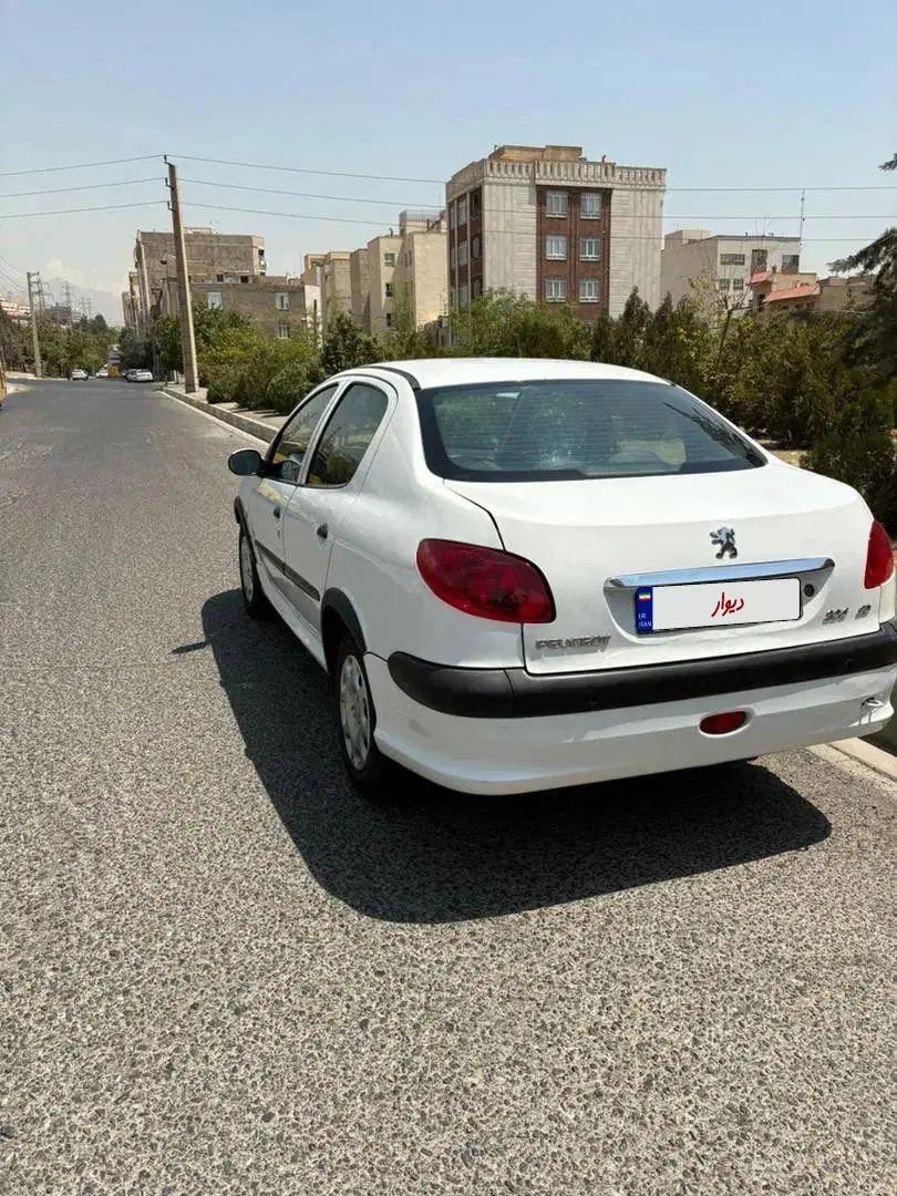 پژو ۲۰۶ صندوق دار v8 - 1394