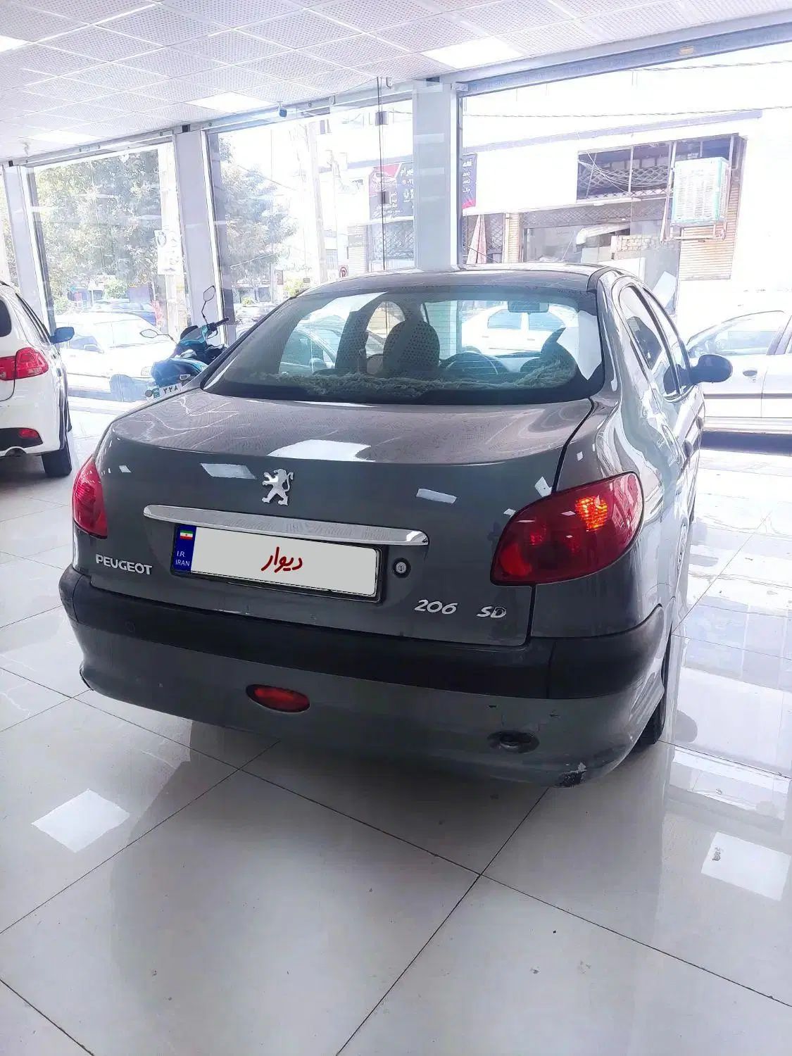 پژو ۲۰۶ صندوق دار v8 - 1393