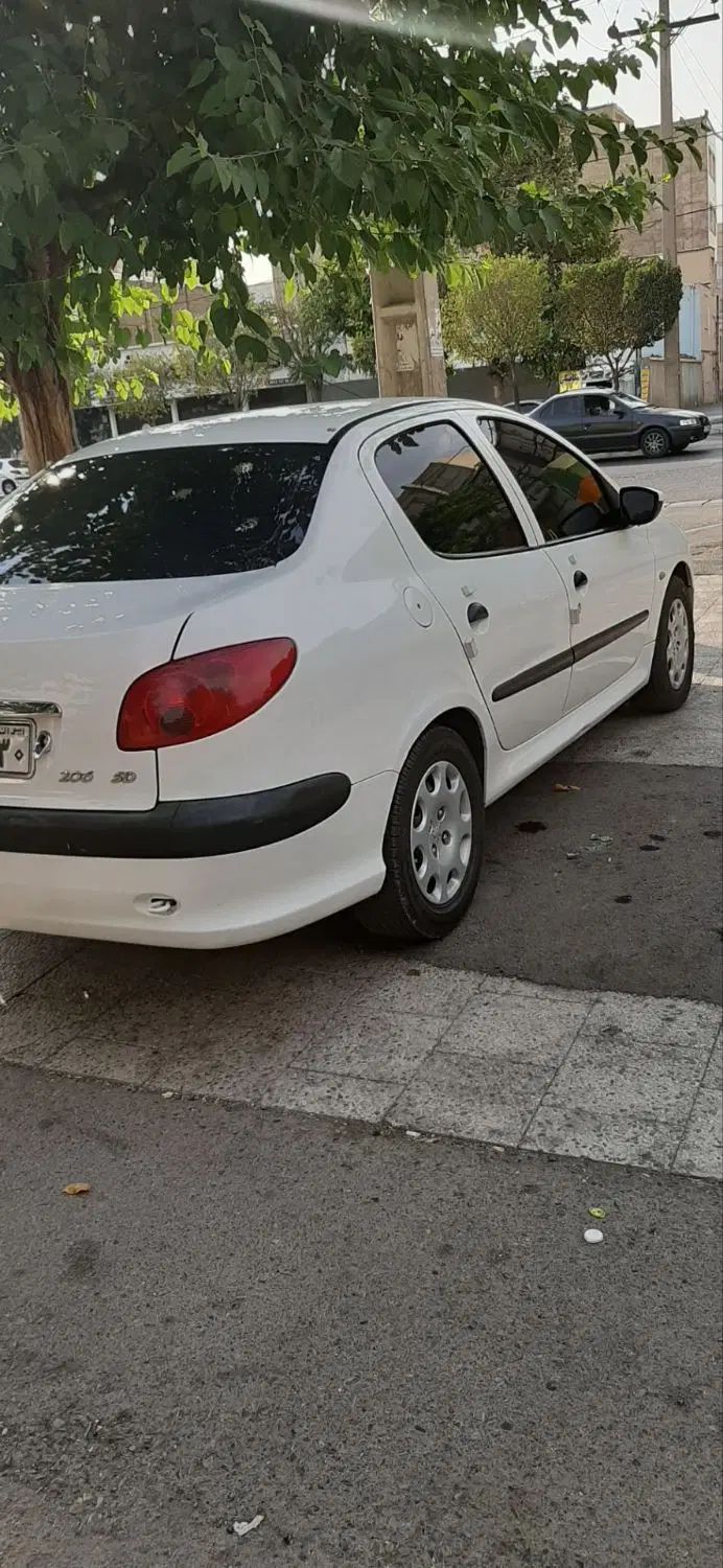 پژو ۲۰۶ صندوق دار v8 - 1394