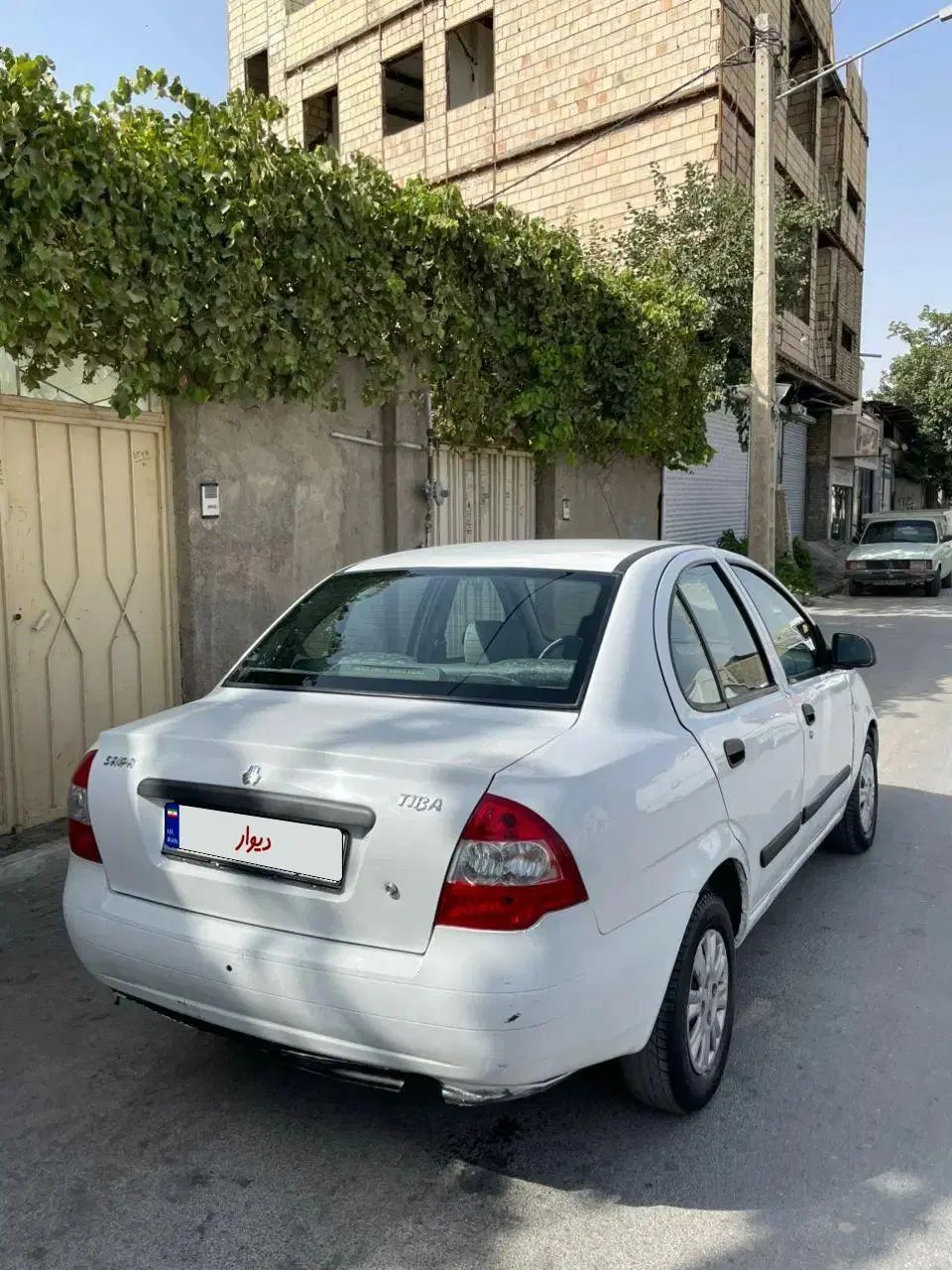 تیبا صندوق دار SX - 1395