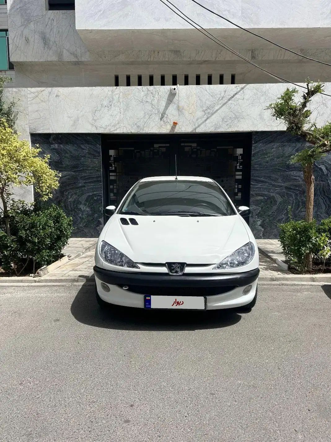 پژو ۲۰۶ صندوق دار v8 - 1396