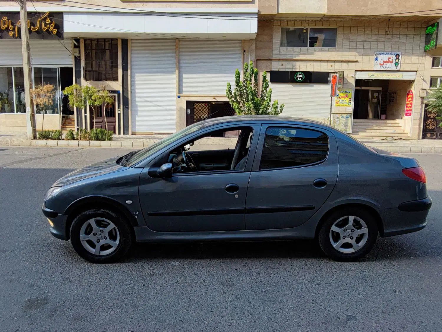 پژو ۲۰۶ صندوق دار v8 - 1397