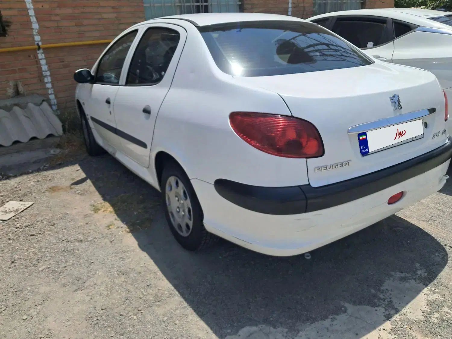 پژو ۲۰۶ صندوق دار v8 - 1399
