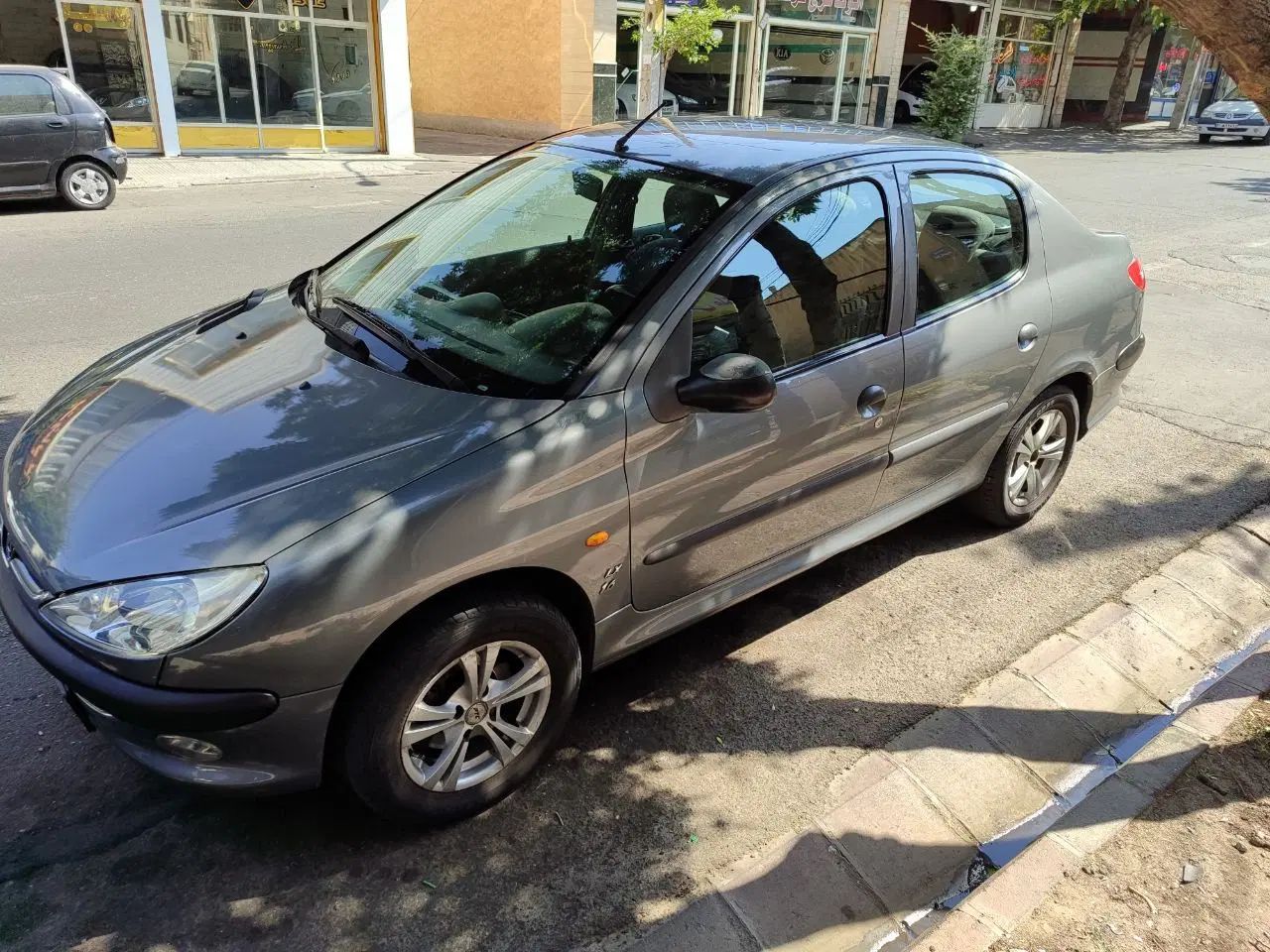 پژو ۲۰۶ صندوق دار v8 - 1395