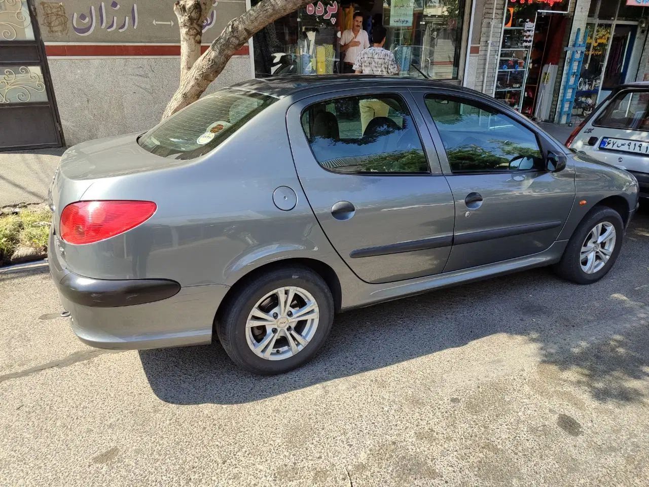 پژو ۲۰۶ صندوق دار v8 - 1395