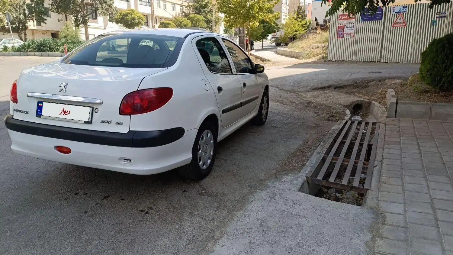 پژو ۲۰۶ صندوق دار v8 - 1391