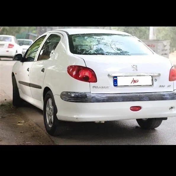 پژو ۲۰۶ صندوق دار v8 - 1394