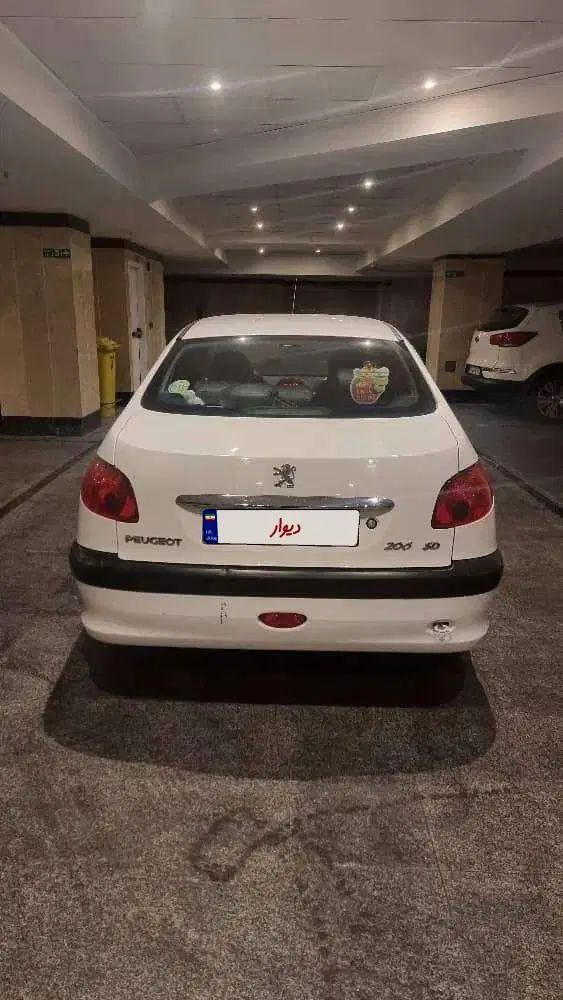 پژو ۲۰۶ صندوق دار v8 - 1399