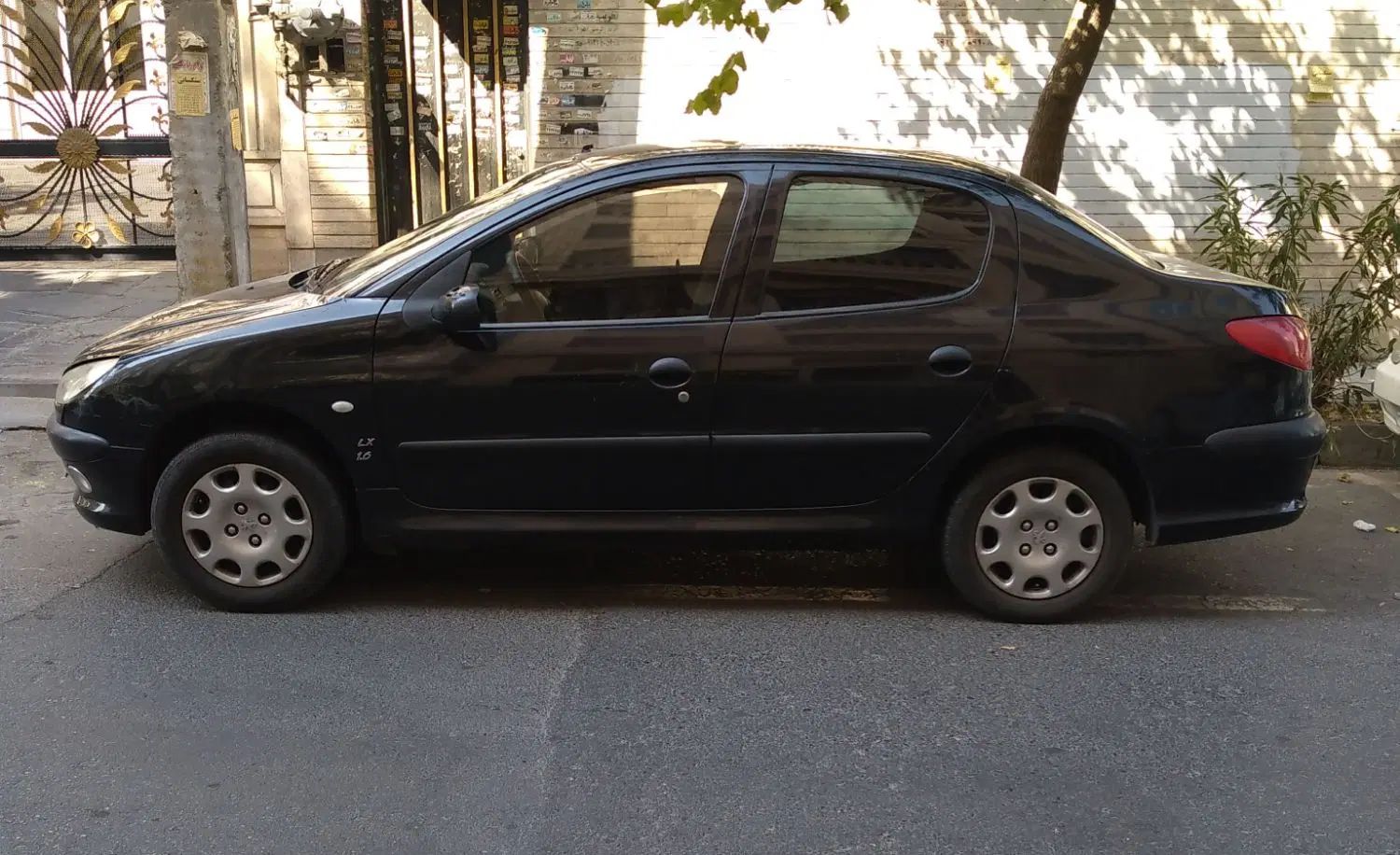 پژو ۲۰۶ صندوق دار v8 - 1390