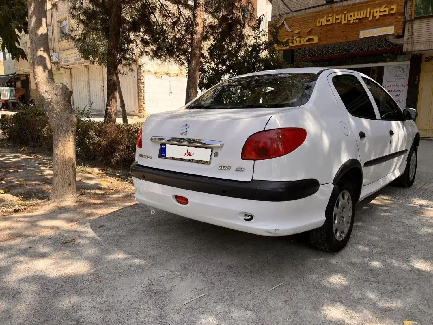 پژو ۲۰۶ صندوق دار v8 - 1395