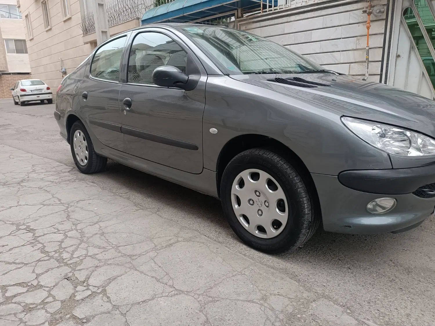 پژو ۲۰۶ صندوق دار v8 - 1395