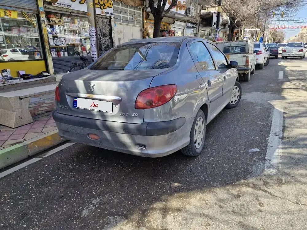 پژو ۲۰۶ صندوق دار v8 - 1392
