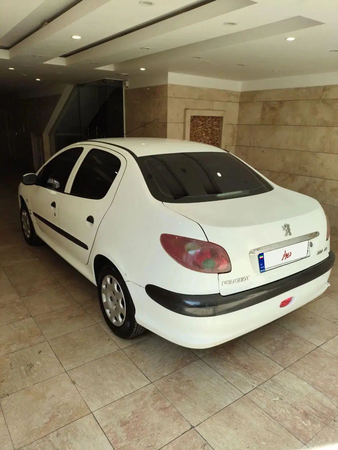 پژو ۲۰۶ صندوق دار v8 - 1391