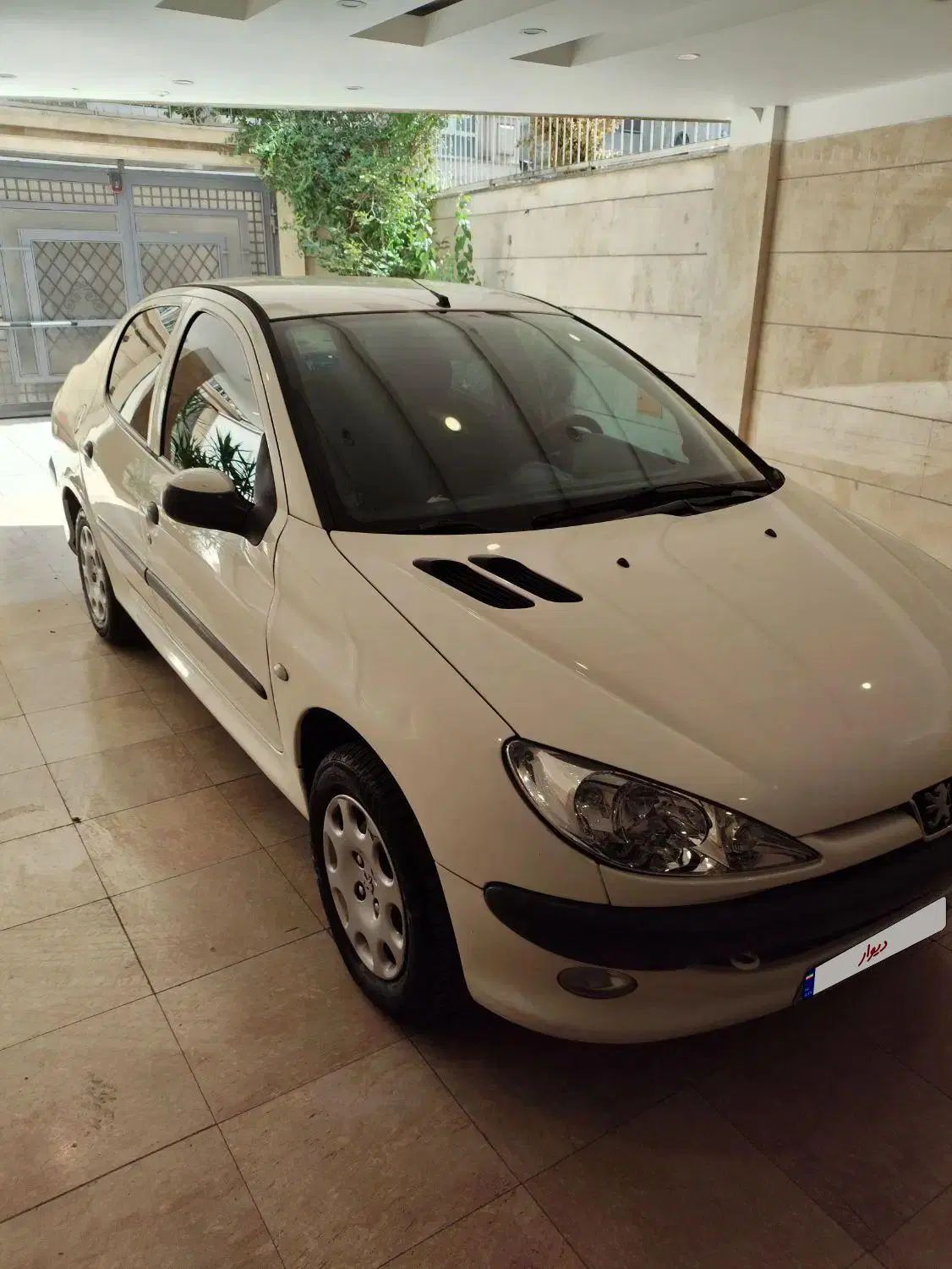 پژو ۲۰۶ صندوق دار v8 - 1391