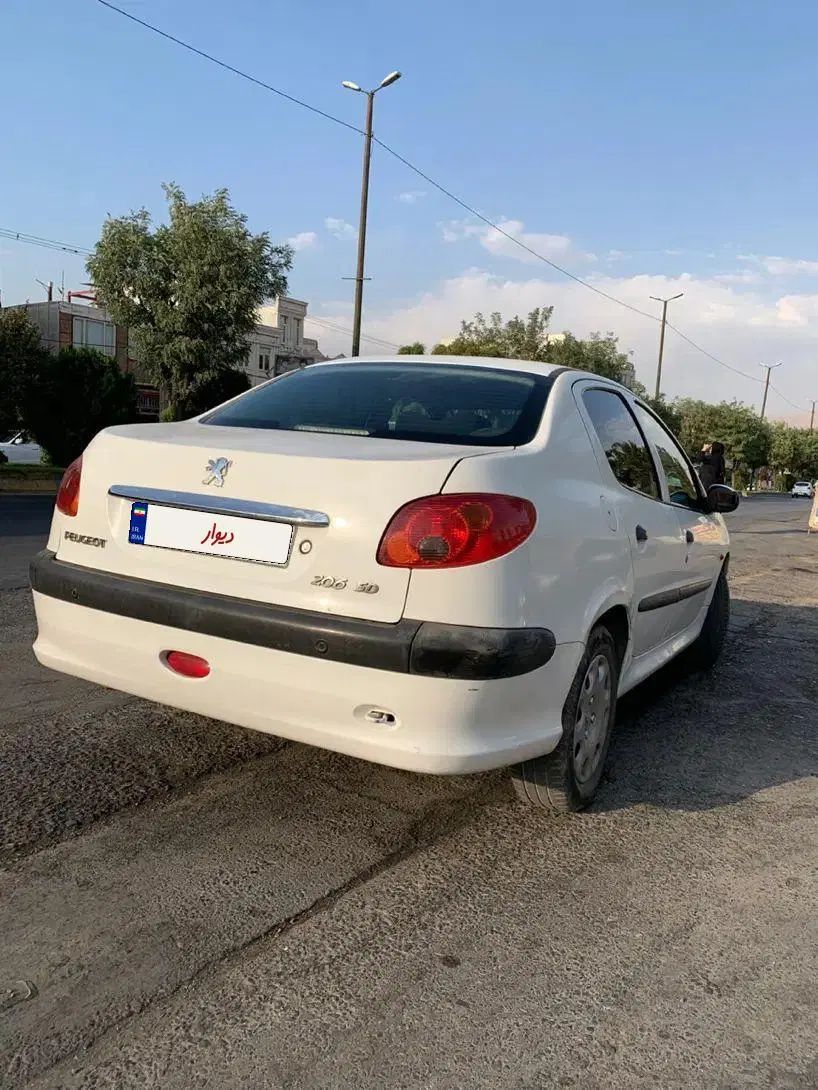 پژو ۲۰۶ صندوق دار v8 - 1394