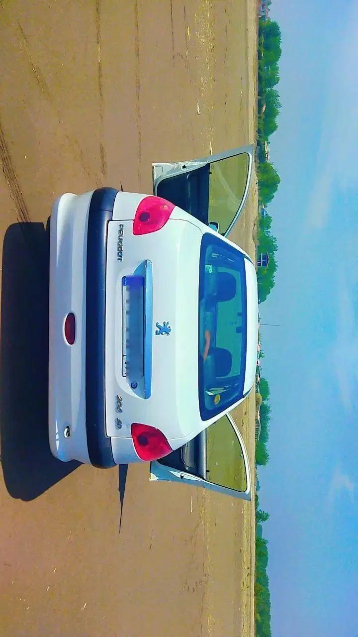 پژو ۲۰۶ صندوق دار v8 - 1391