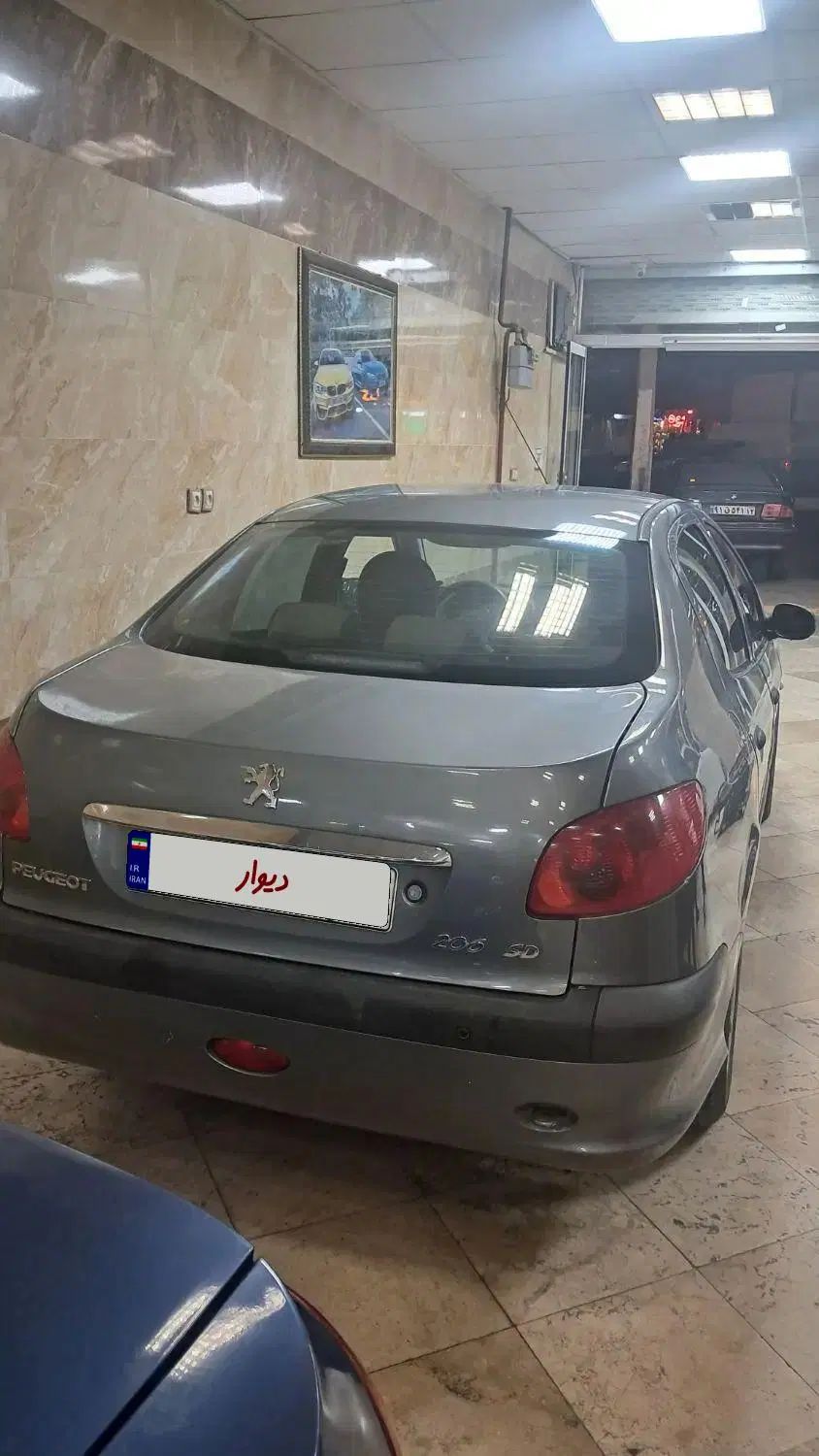 پژو ۲۰۶ صندوق دار v8 - 1396