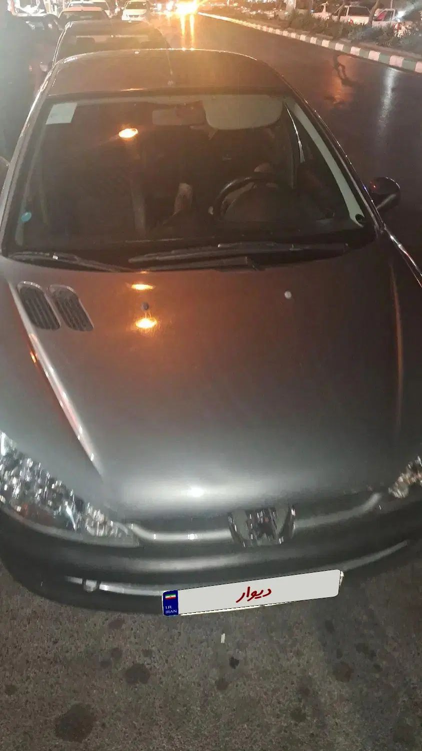 پژو ۲۰۶ صندوق دار v8 - 1396