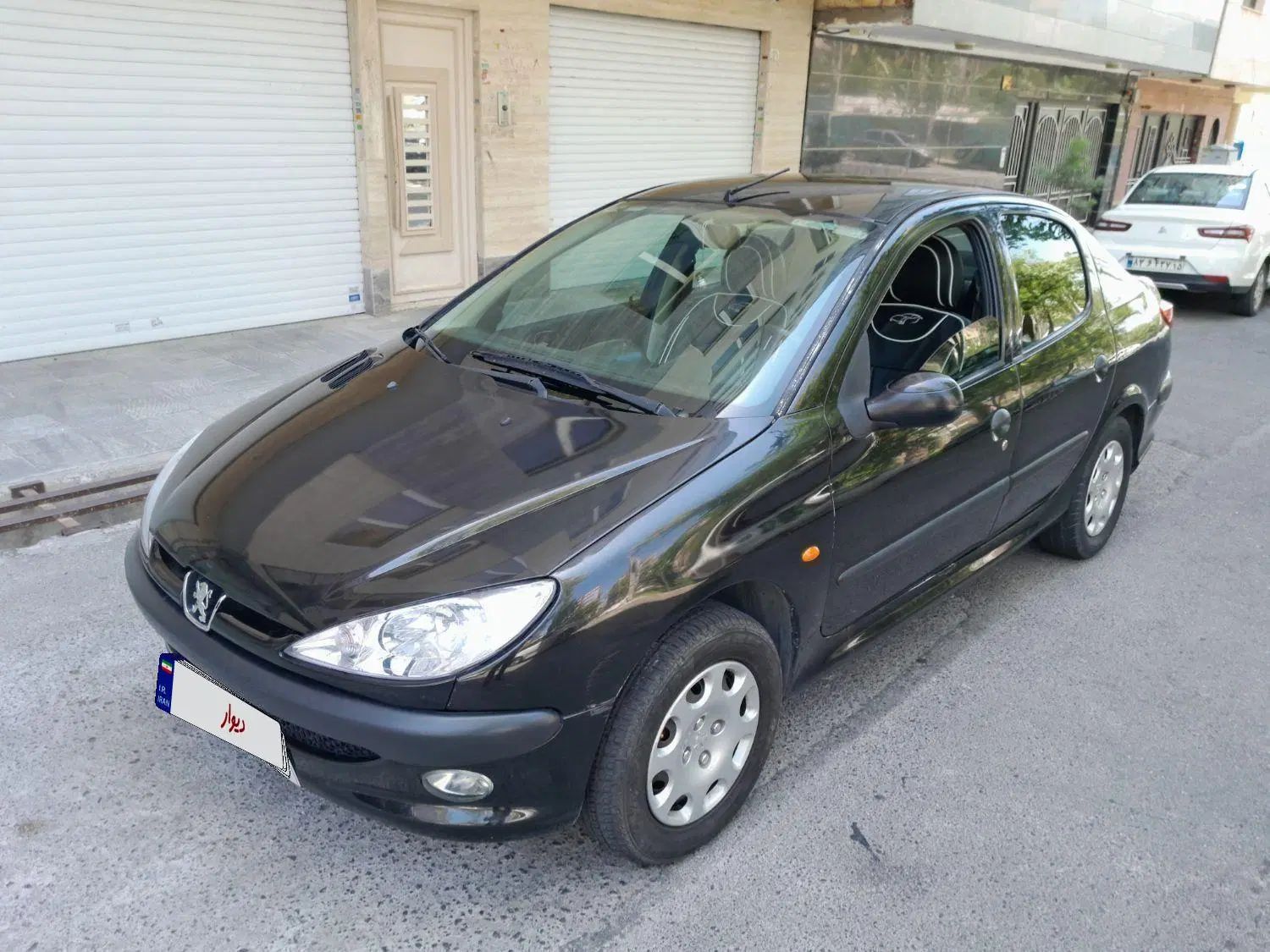 پژو ۲۰۶ صندوق دار v9 - 1389