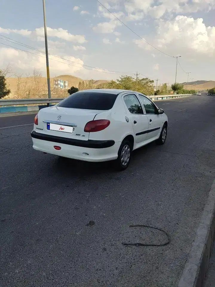 پژو ۲۰۶ صندوق دار v8 - 1390